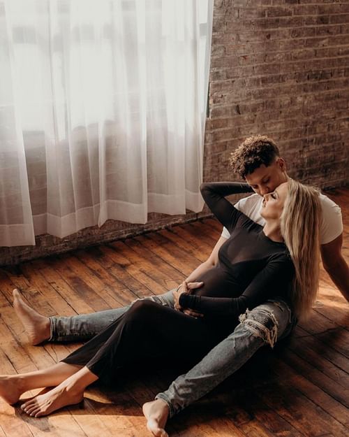 The Chiefs QB posing with Brittany on the wooden floor. Source: Brittany Mahomes IG