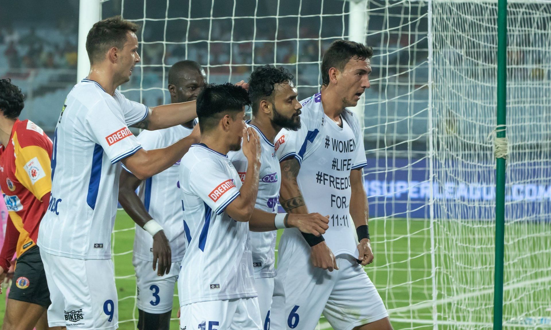 Vafa Hakhamaneshi celebrates his goal against East Bengal FC for Chennaiyin FC with a message for Iranian women. (Image: ISL)