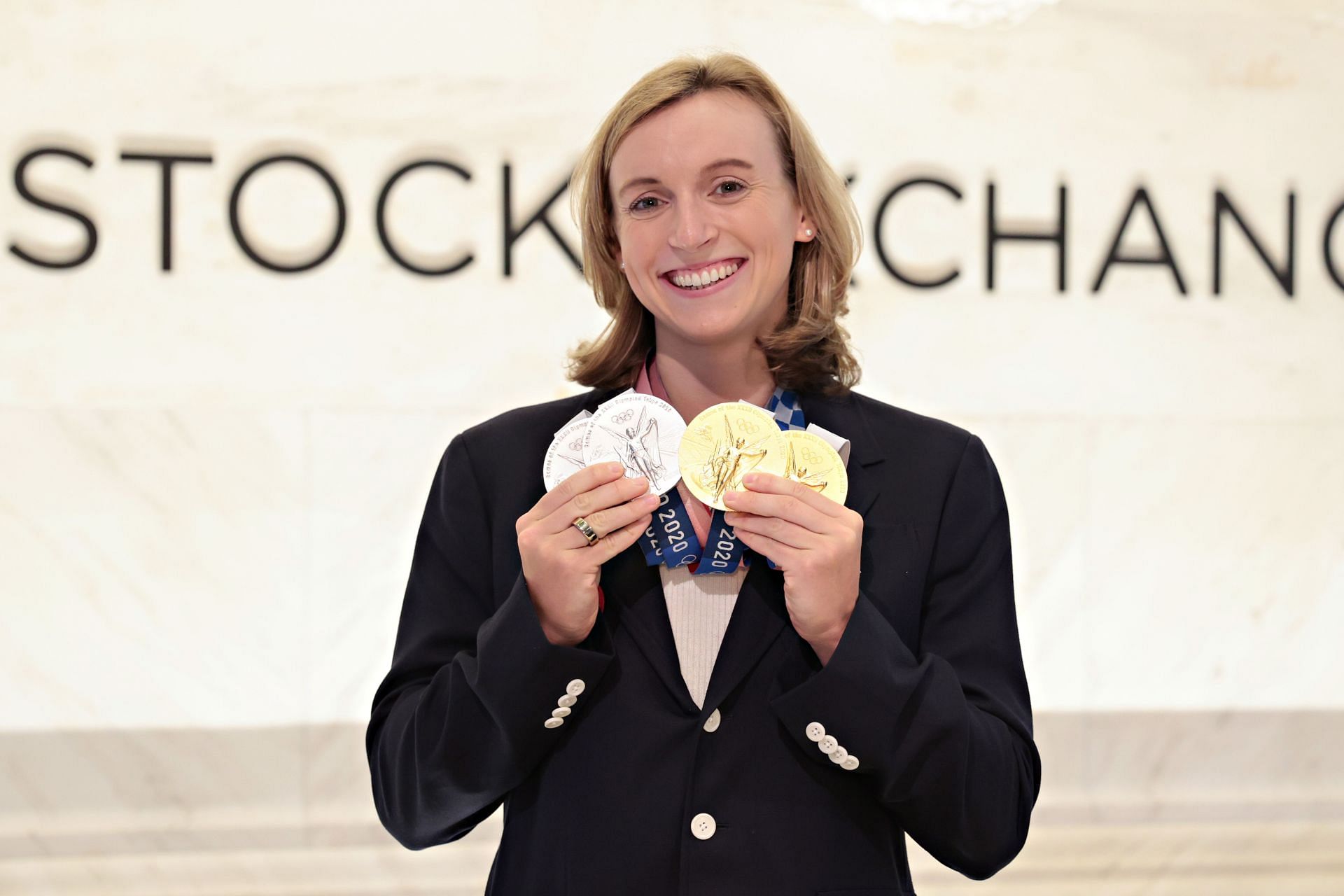 Olympic Swimmer Katie Ledecky Rings New York Stock Exchange Closing Bell