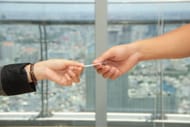 Importance of exchanging name cards (Image via Van Tay Media/unsplash.com)
