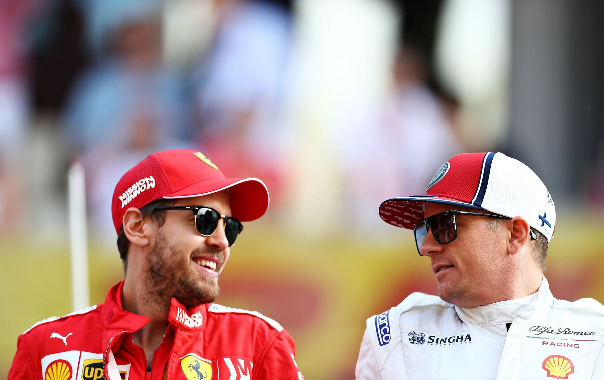 Sebastian Vettel (Left) and Kimi Raikkonen (Right) before the 2019 F1 Abu Dhabi Grand Prix (Image via Mark Thompson/Getty Images)