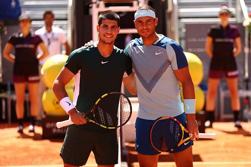 Carlos Alcaraz(L) and Rafael Nadal (R) pictured at the 2022 Mutua Madrid Open