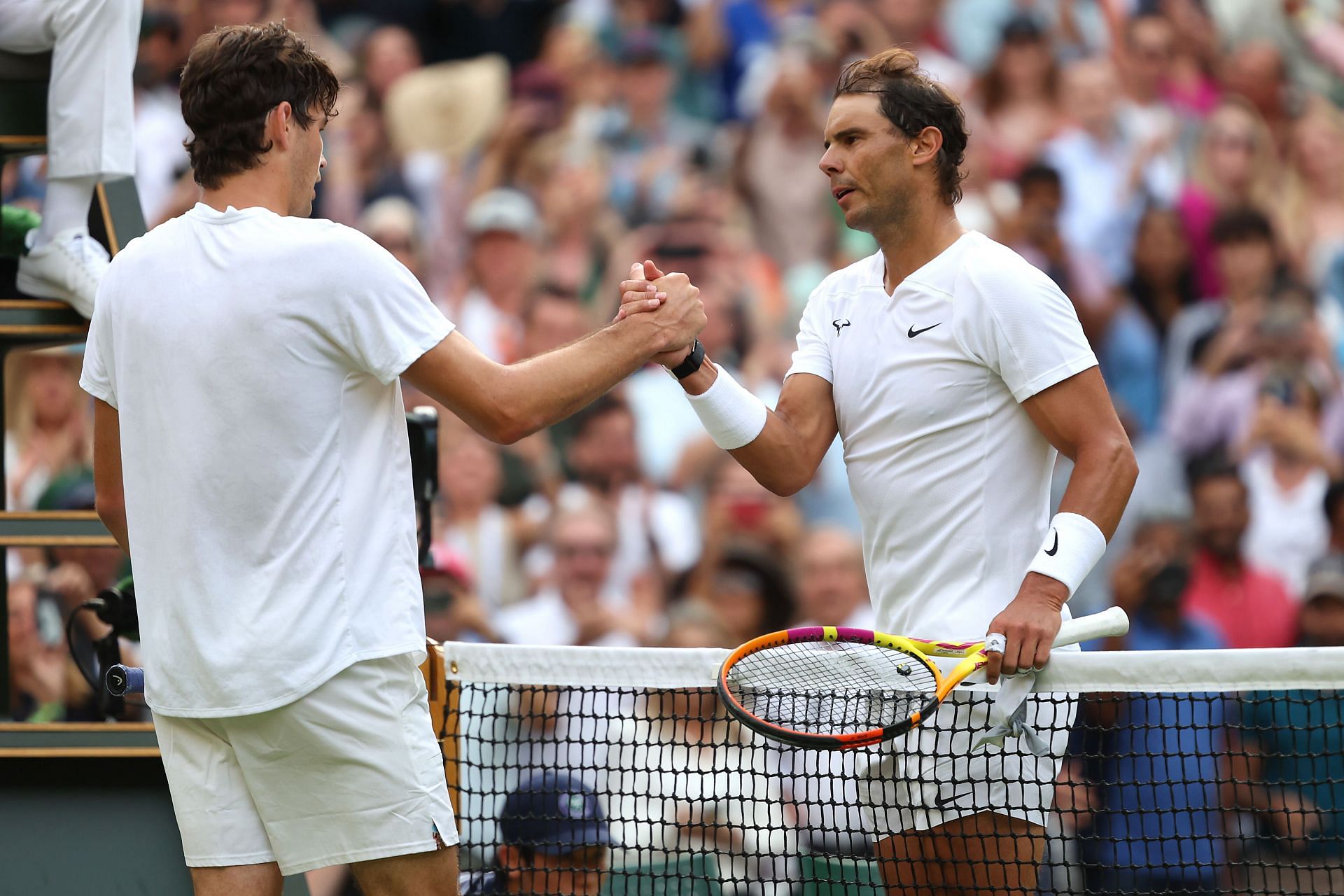 Taylor Fritz (L) and Rafael Nadal