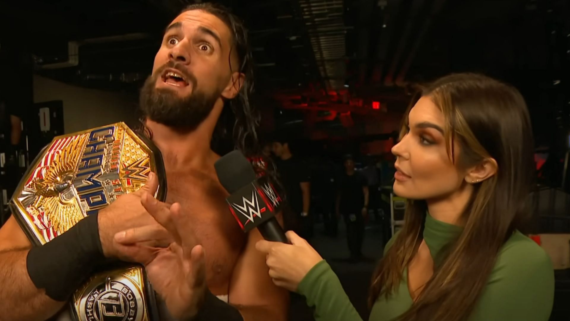 Seth Rollins (left); WWE interviewer Cathy Kelley (right)