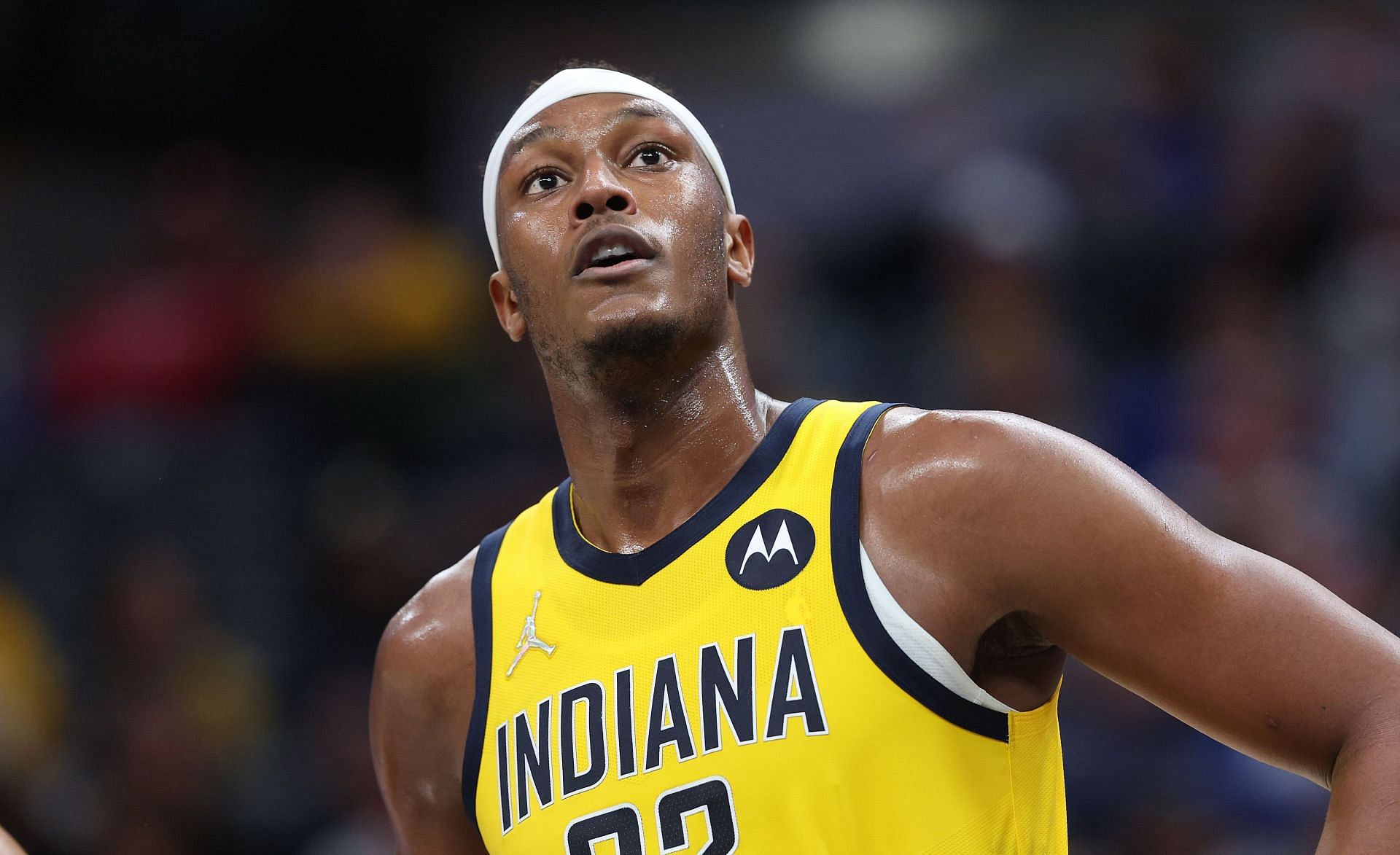 Myles Turner looks on at the game