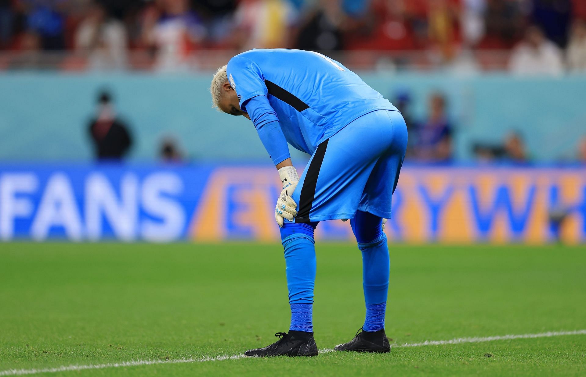 Keylor Navas cuts a dejected figure following Costa Rica&#039;s humiliating defeat.