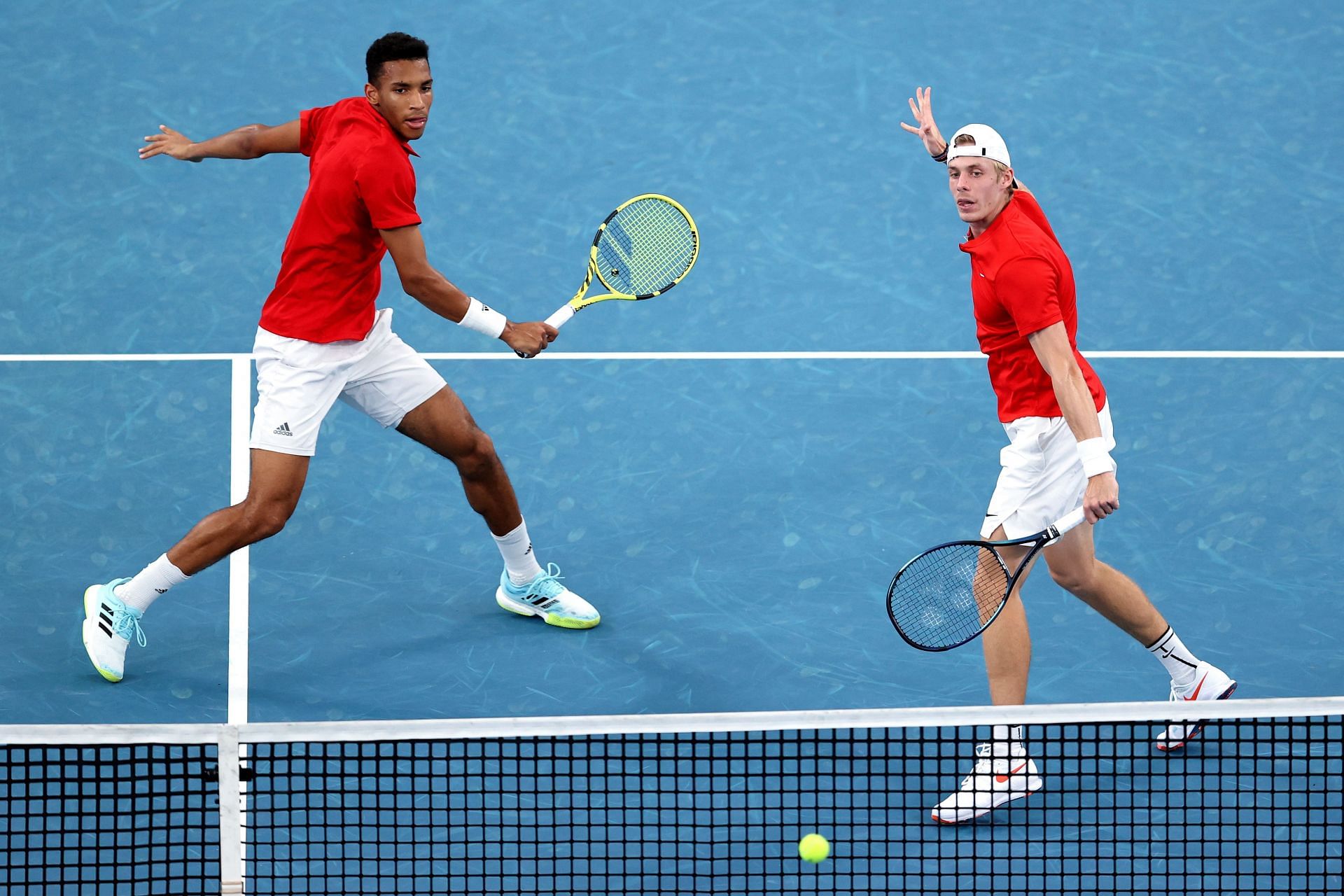 Felix Auger-Aliassime and Denis Shapovalov in action at the 2022 ATP Cup
