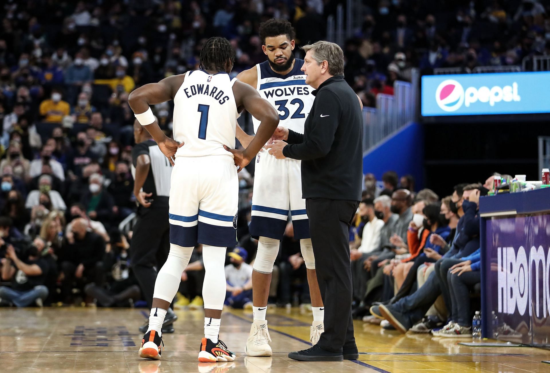 Head coach Chris Finch, Anthony Edwards and Karl-Anthony Towns of the Minnesota Timberwolves