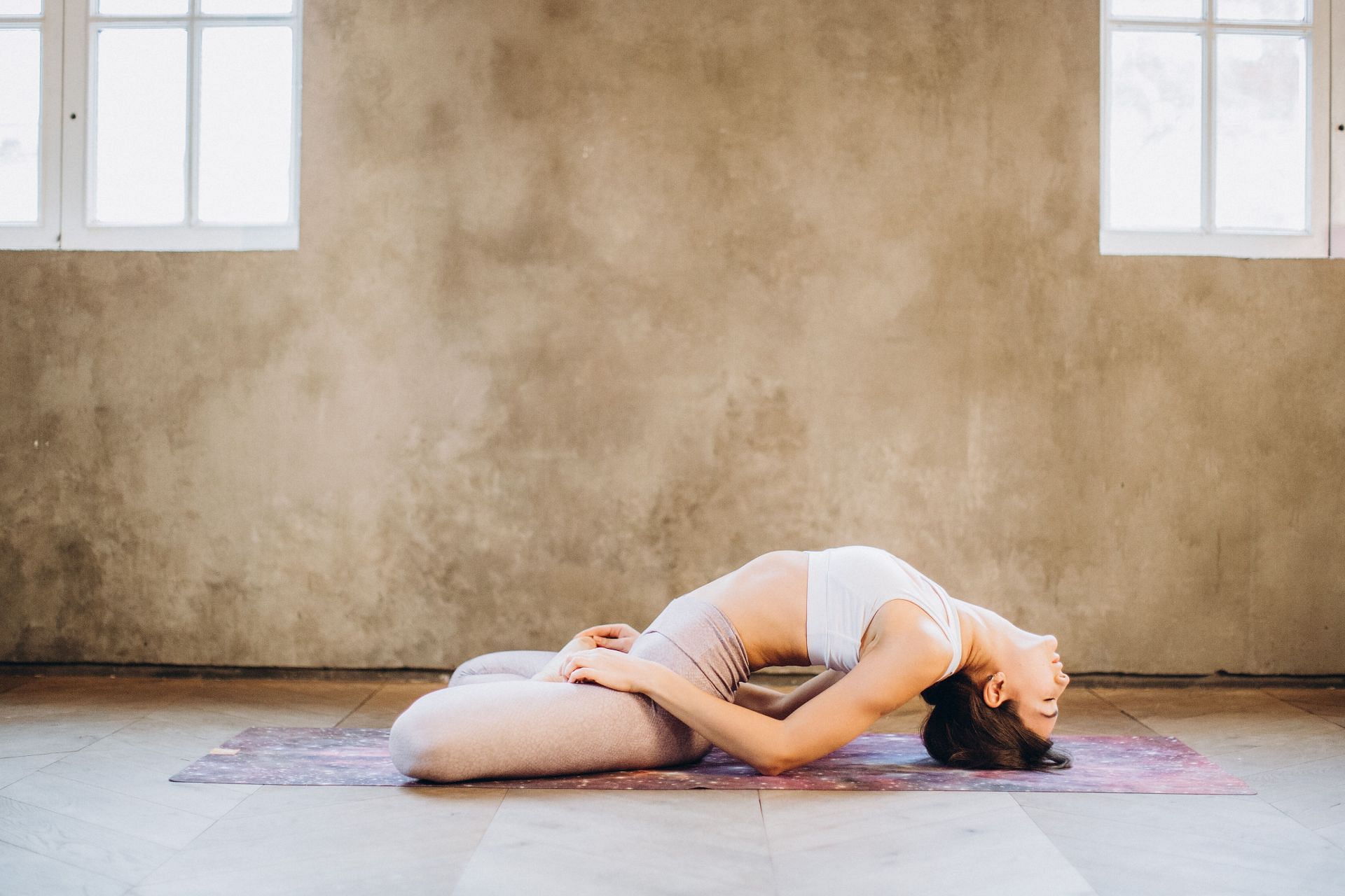 Daily yoga practice helps in improving your gut health. (Image via Pexels / Elina Fairytale)