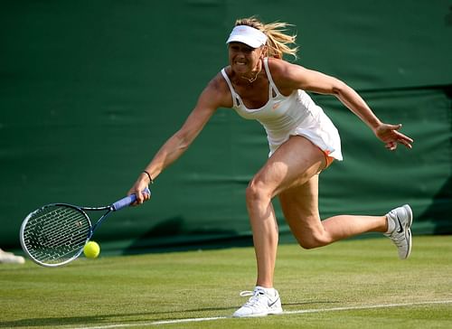 Maria Sharapova in action at the 2013 Wimbledon Championships