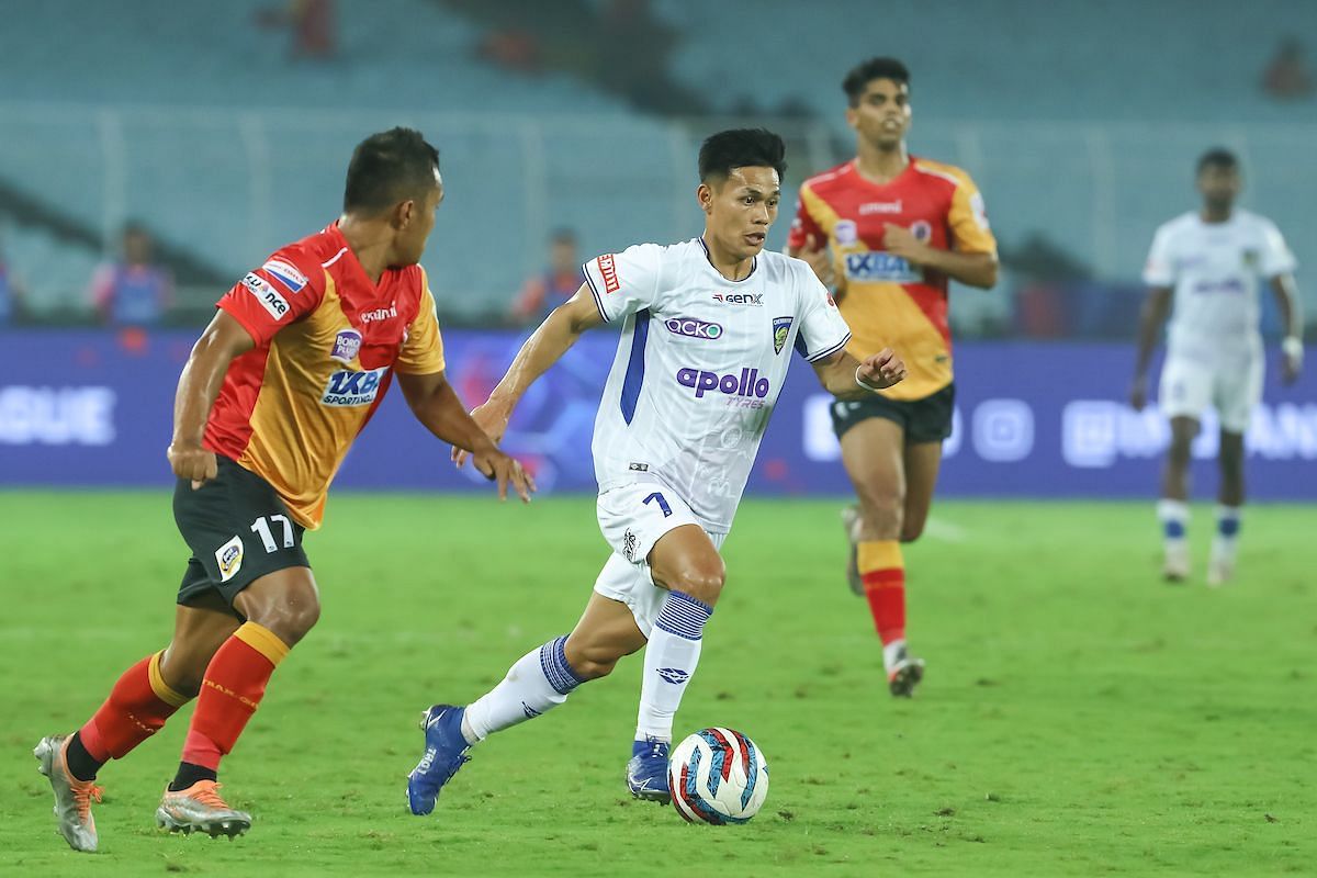 Chennaiyin FC and East Bengal players tussling for the ball. 