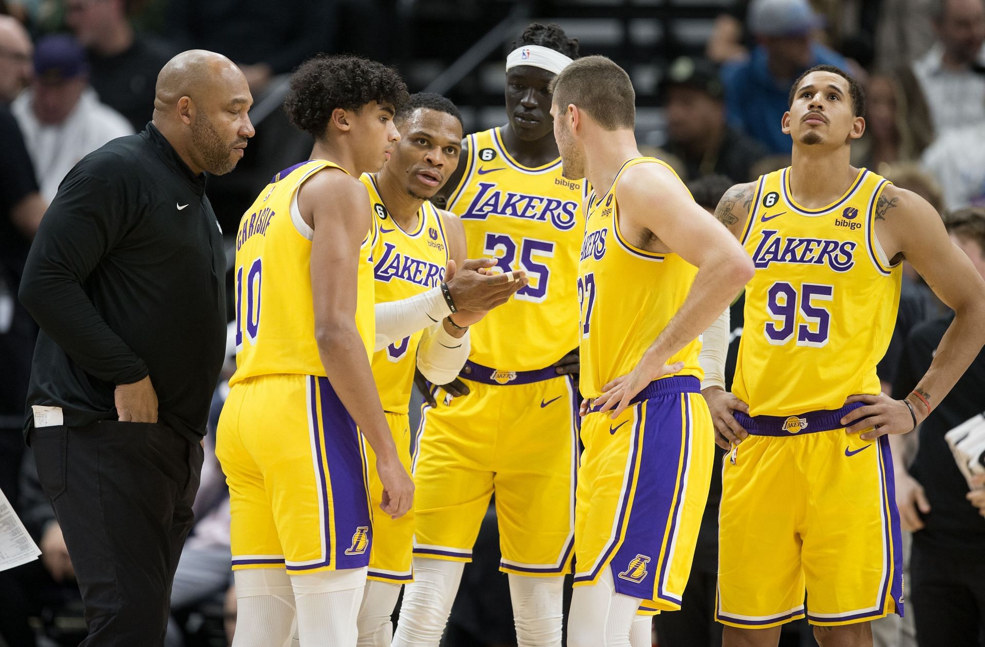 Russell Westbrook of the LA Lakers talks to the teammates as head coach Darvin Hamm listens