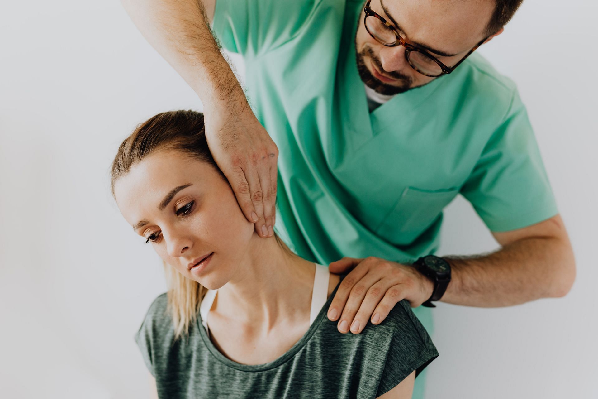 Neck pain is a common ailment, especially in the younger generation who spend a lot of their time staring at laptop screens (Image via Pexels @Karolina Grabowska)
