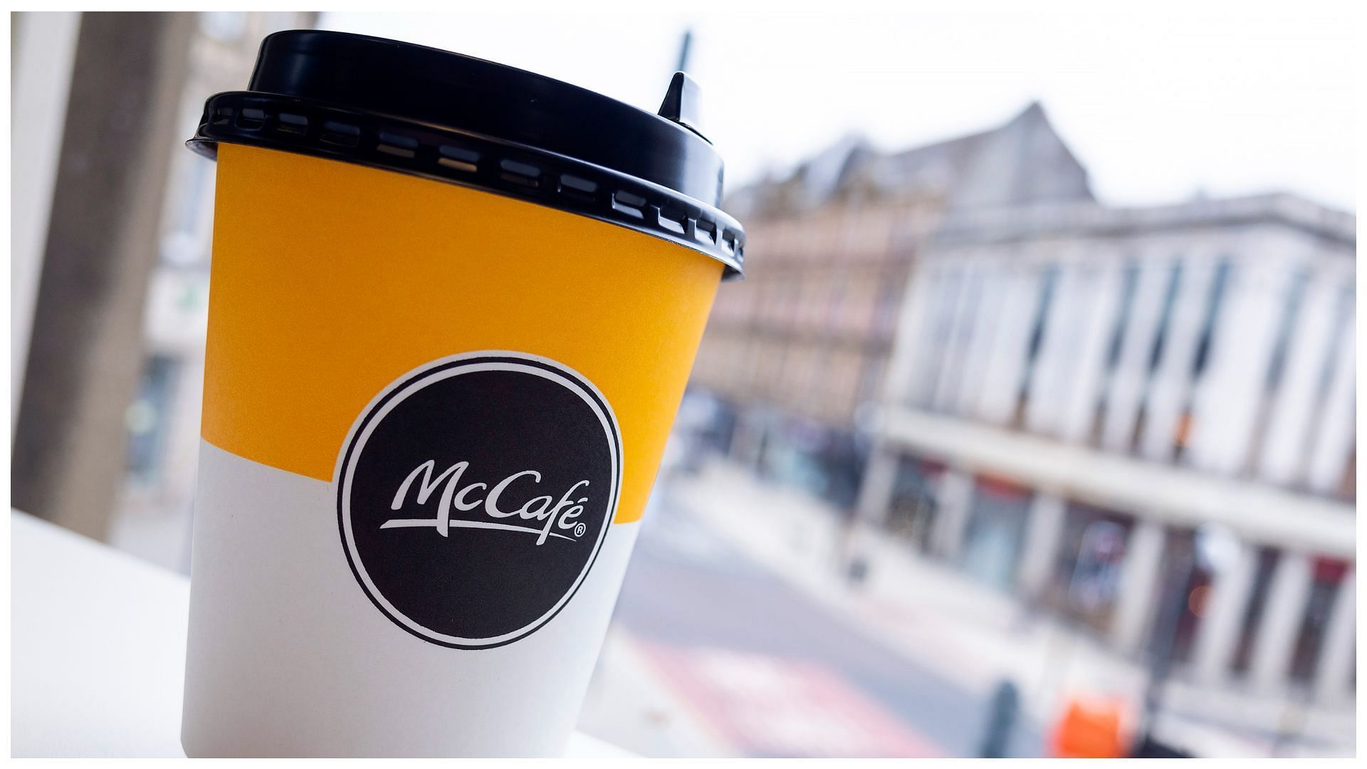 a coffee cup with a plastic lid featuring the McDonald&#039;s trademark - McCaf&eacute; logo (Image by Daniel Harvey Gonzalez/In Pictures/Getty Images)