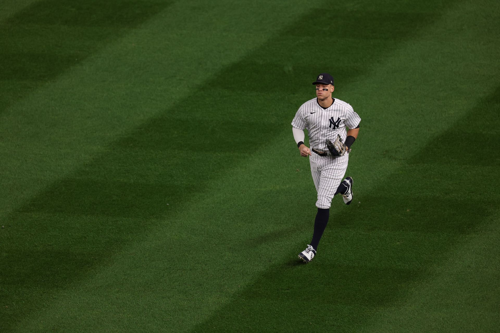 Aaron Judge runs in the outfield against the Houston Astros in game four of the ALCS