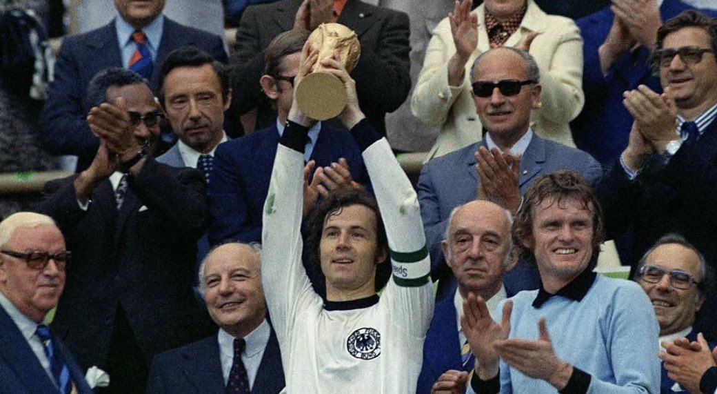 Franz Beckenbauer with the 1974 FIFA World Cup | via: @Firefootball88