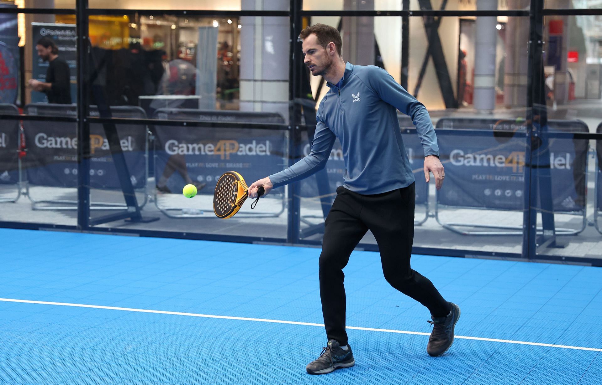 Andy Murray playing padel at an event in London