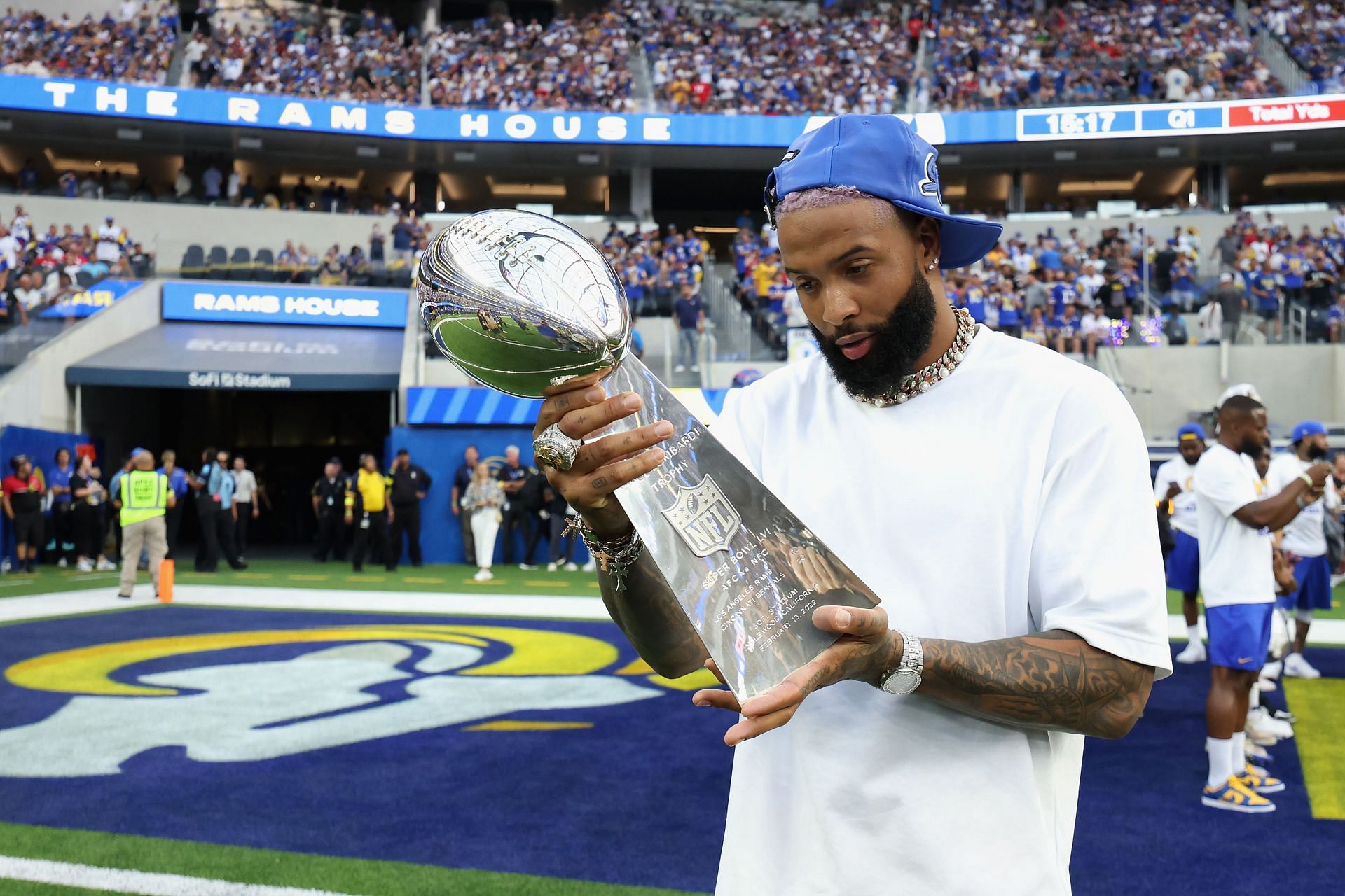 Odell Beckham Jr. holds a Lombardi Trophy