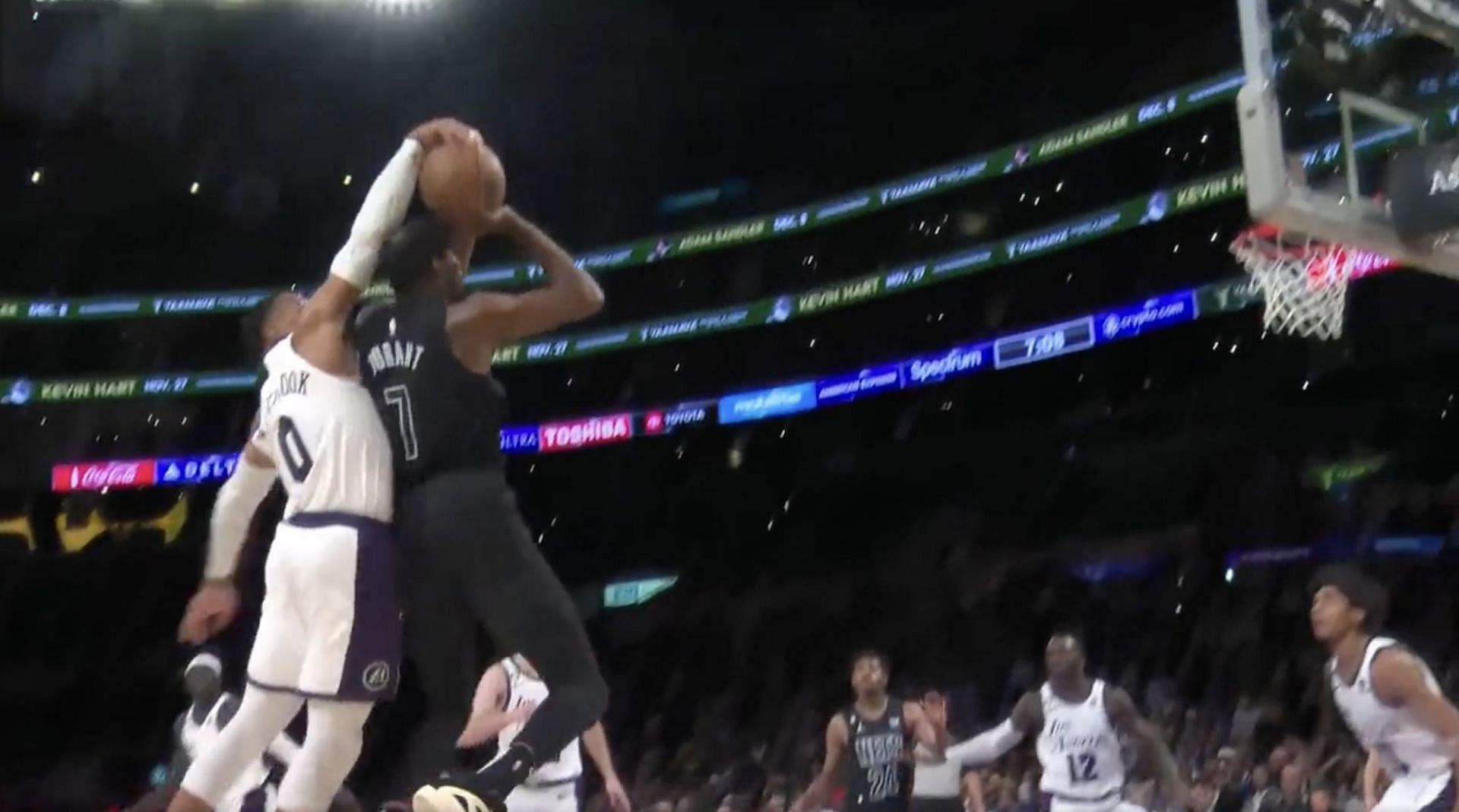 Russell Westbrook blocks Kevin Durant during Nets vs. Lakers game [Photo source: Bleacher Report]