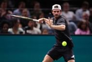 Tommy Paul in action at the Paris Masters