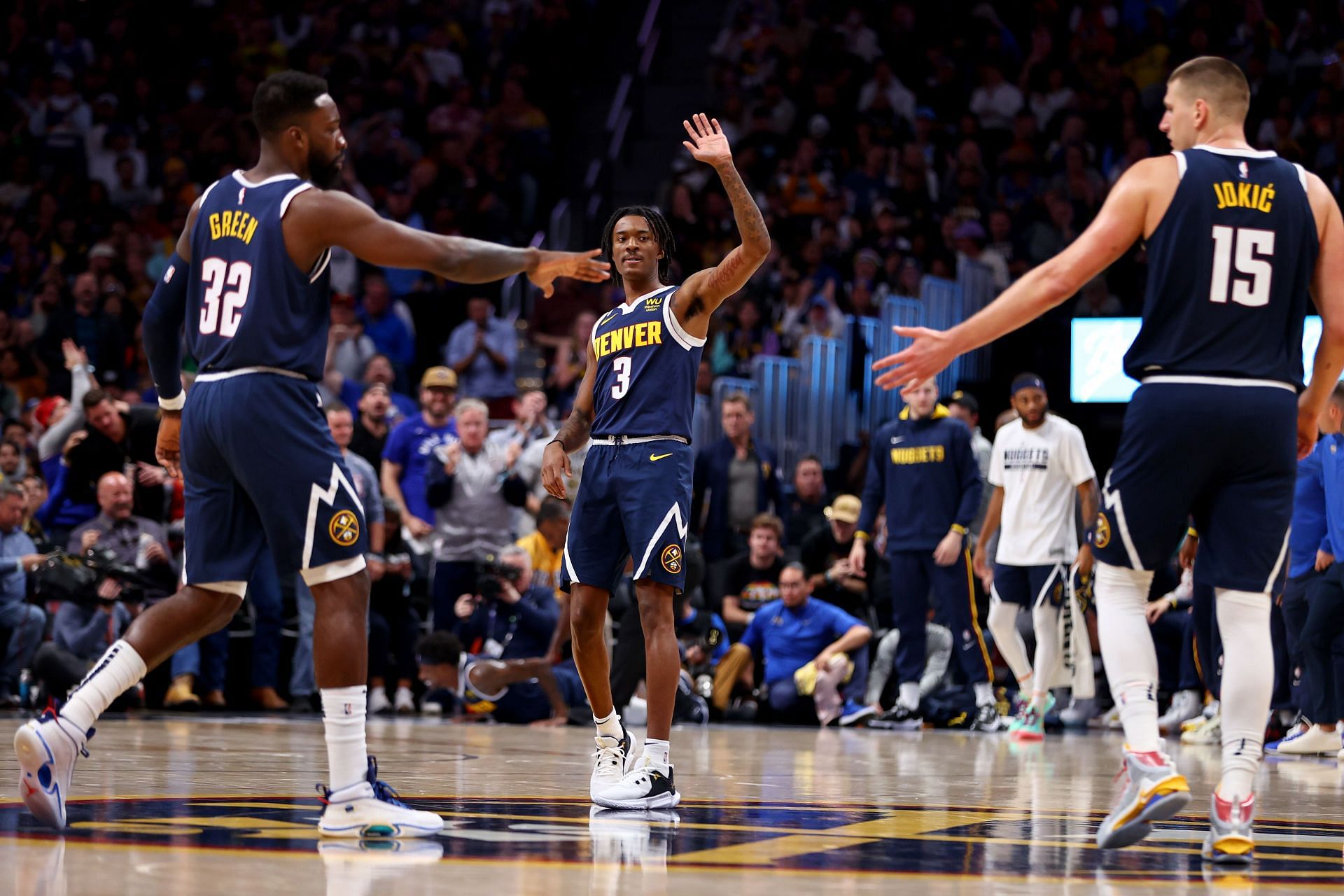 Denver Nuggets big man Nikola Jokic and teammates