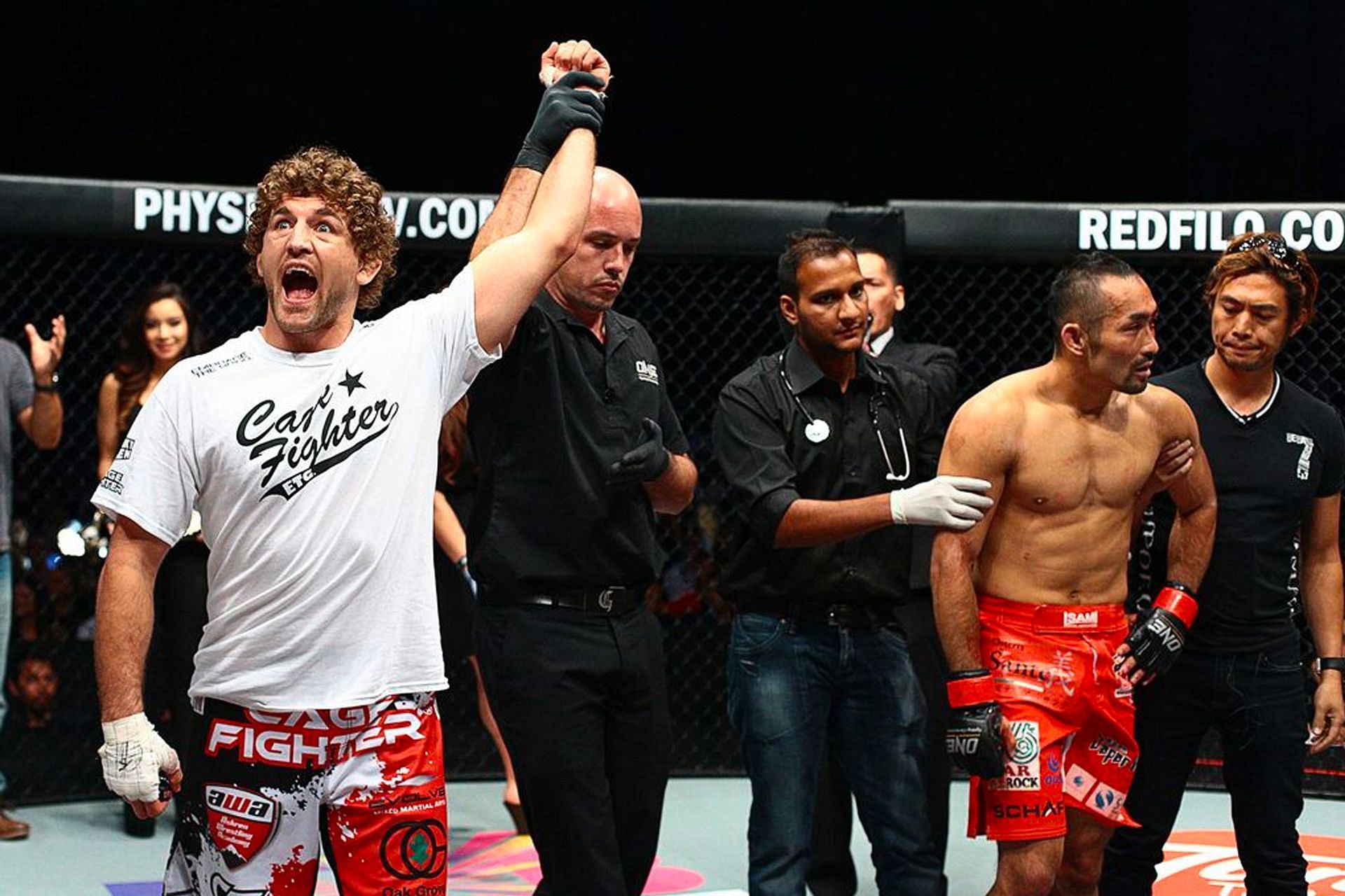 Ben Askren (left) celebrates his win over Nobutatsu Suzuki (right) [Photo: ONE Championship]