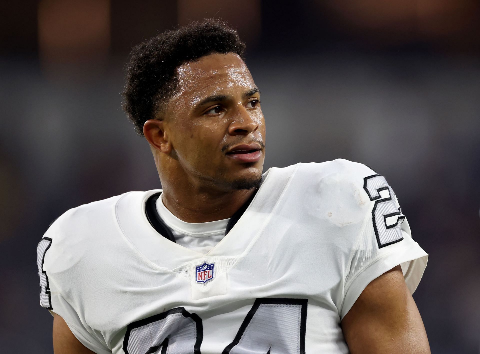 Las Vegas Raiders strong safety Johnathan Abram (24) sprints out onto the  field before the star …