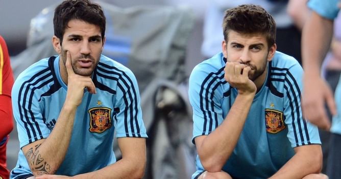Cesc Fabregas reacts to Gerard Pique getting sent off in his final game for Barcelona