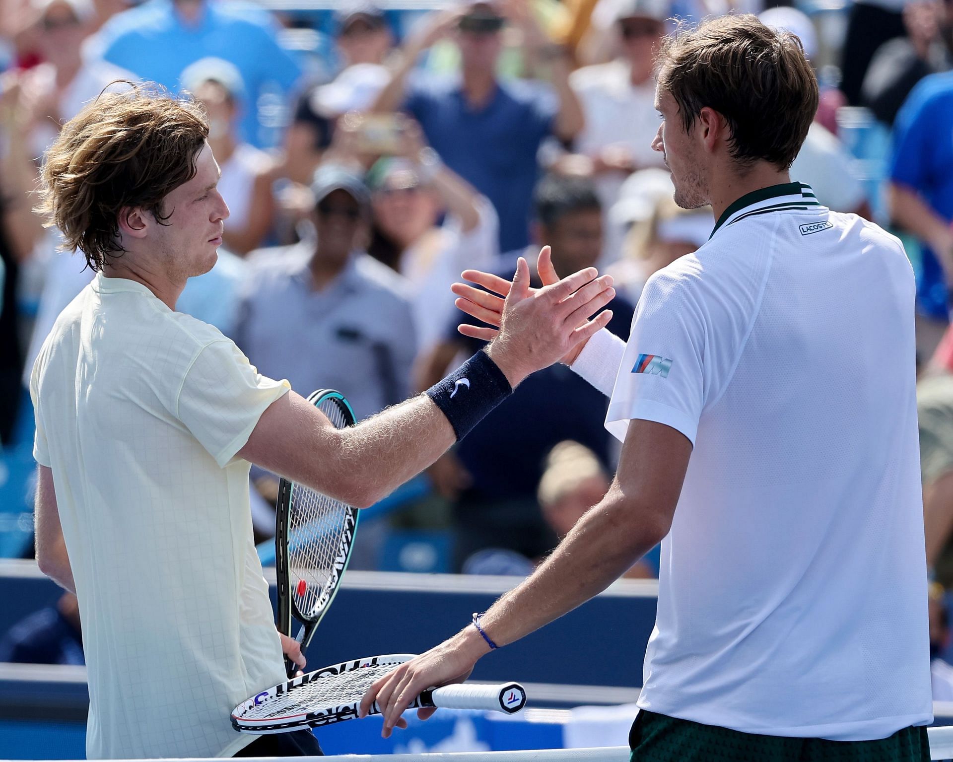 Andrey Rublev (L) and Daniil Medvedev