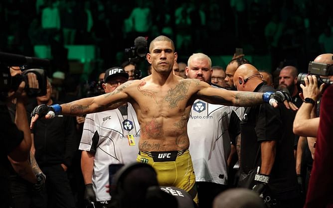 Alex Pereira receives BJJ brown belt from his coach Plinio Cruz following title win at UFC 281
