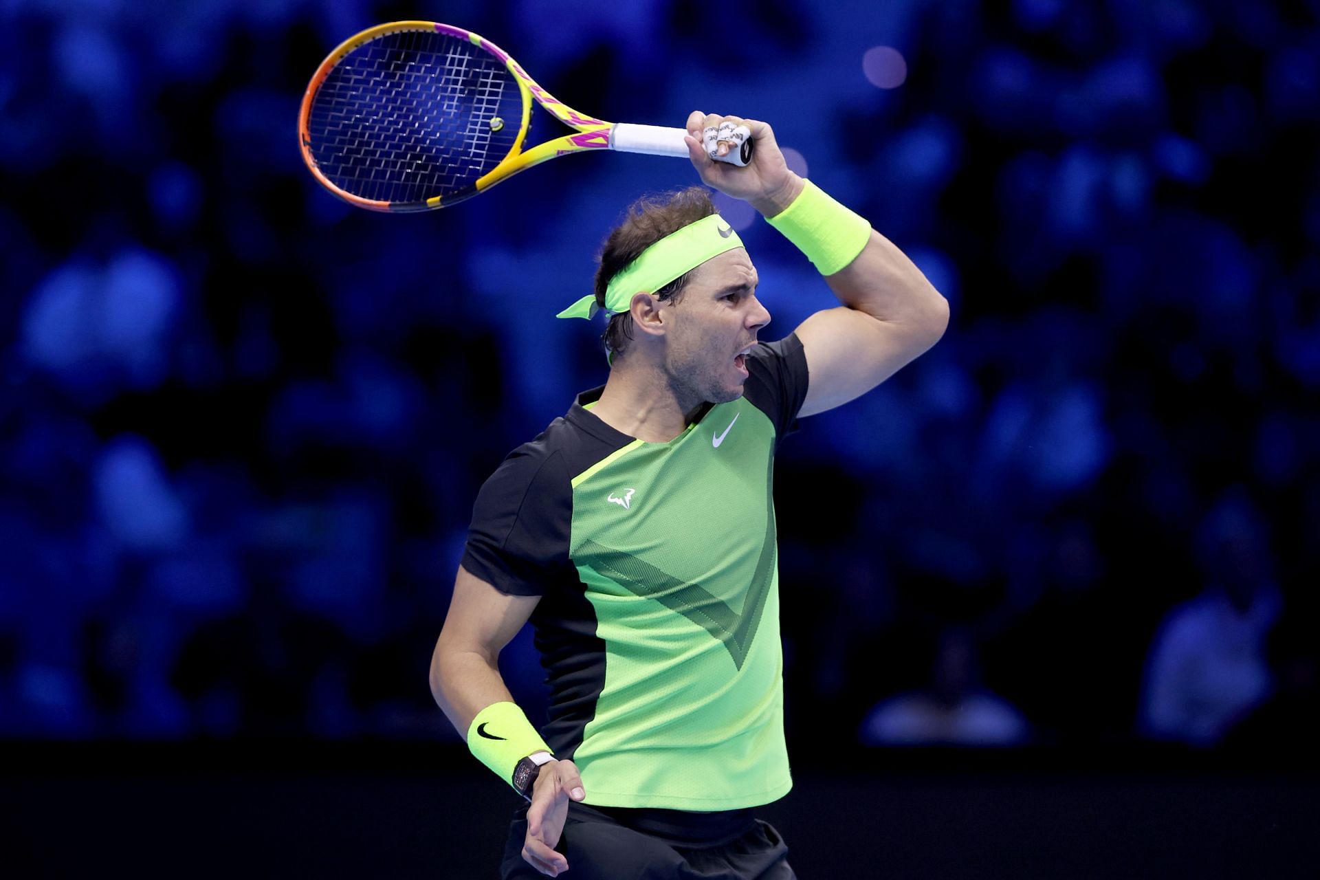 Rafael Nadal returns a shot to Casper Ruud at the 2022 ATP Finals
