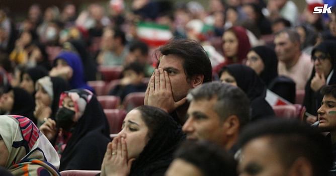 Celebrations erupt in Iran streets after team's loss against USA in the FIFA World Cup; people seen waving US flags