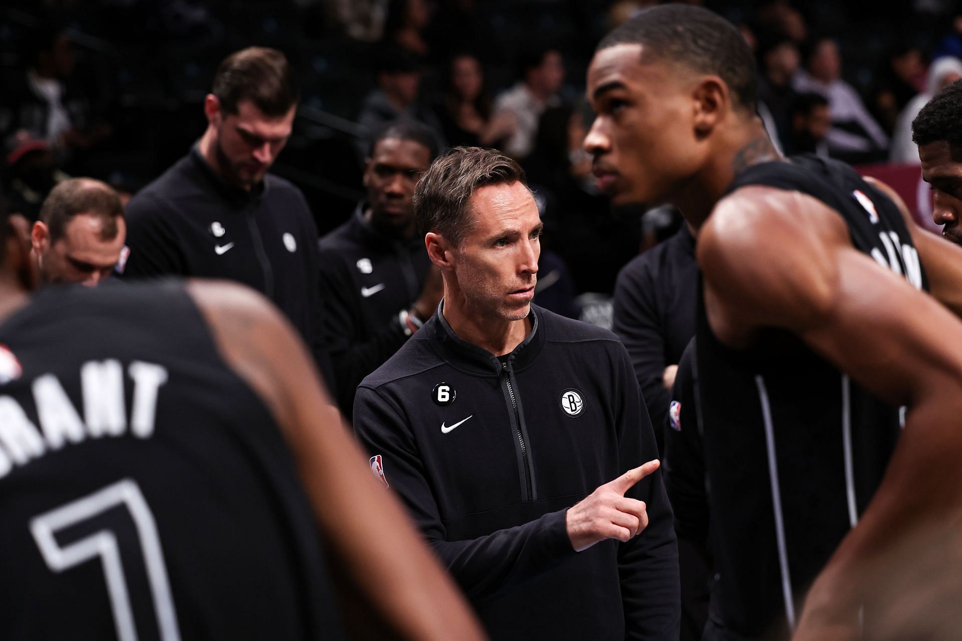 Steve Nash addresses the Brooklyn Nets during a timeout