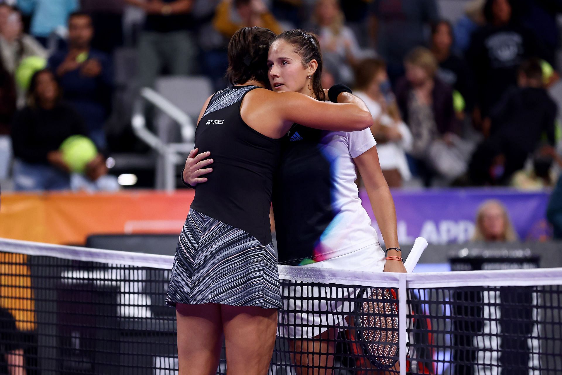 Caroline Garcia hugs Daria Kasatkina after their group stage match at the 2022 WTA Finals.