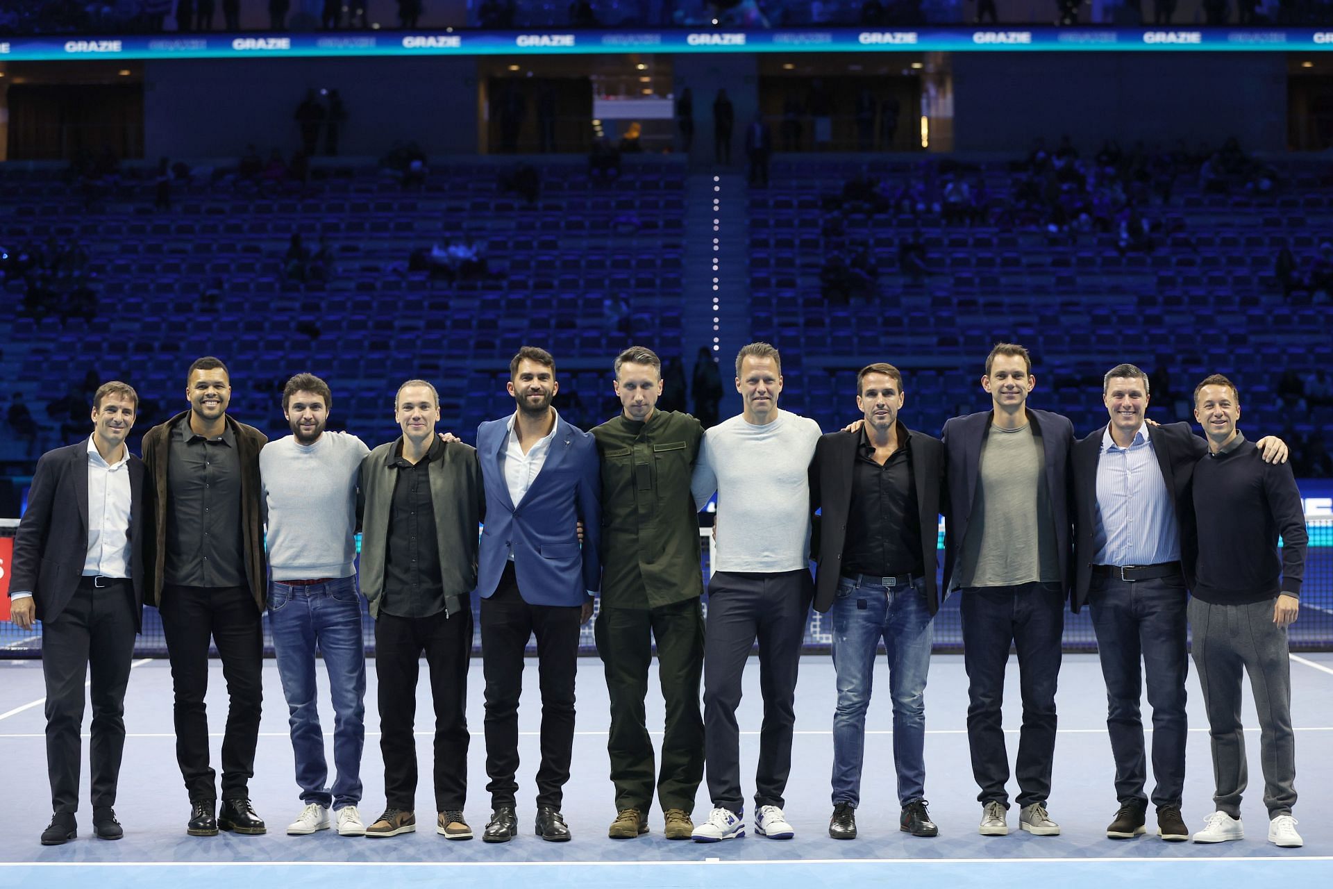 The 11 recently retired stars pose for a photo in Turin.