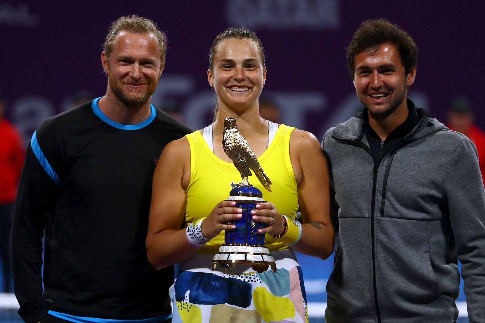 Aryna Sabalenka celebrates with her team, including Dmitry Tursunov, at the 2022 Qatar Open.