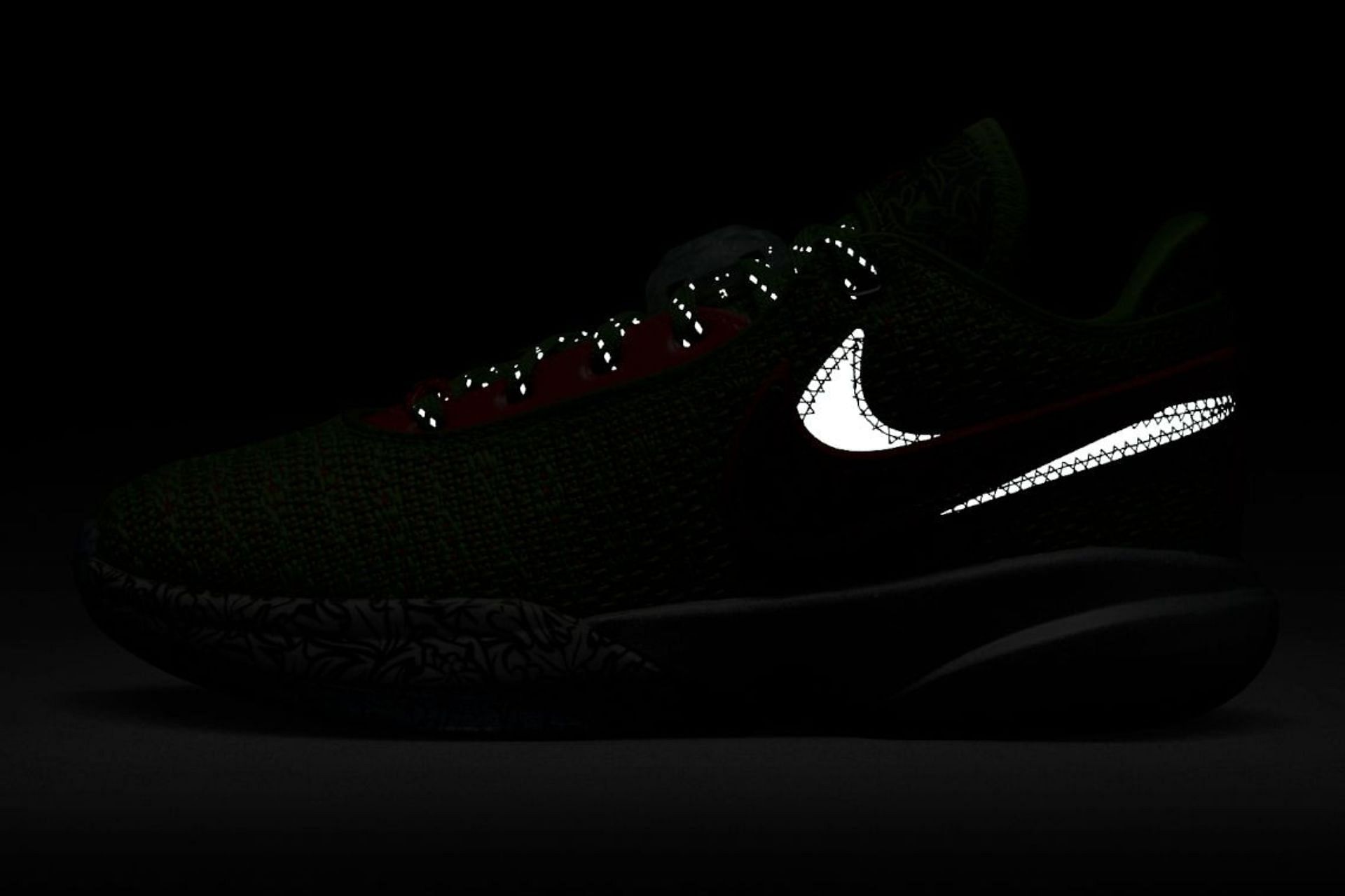 Take a look at the glow-in-the-dark branding accents of the shoes (Image via Nike)