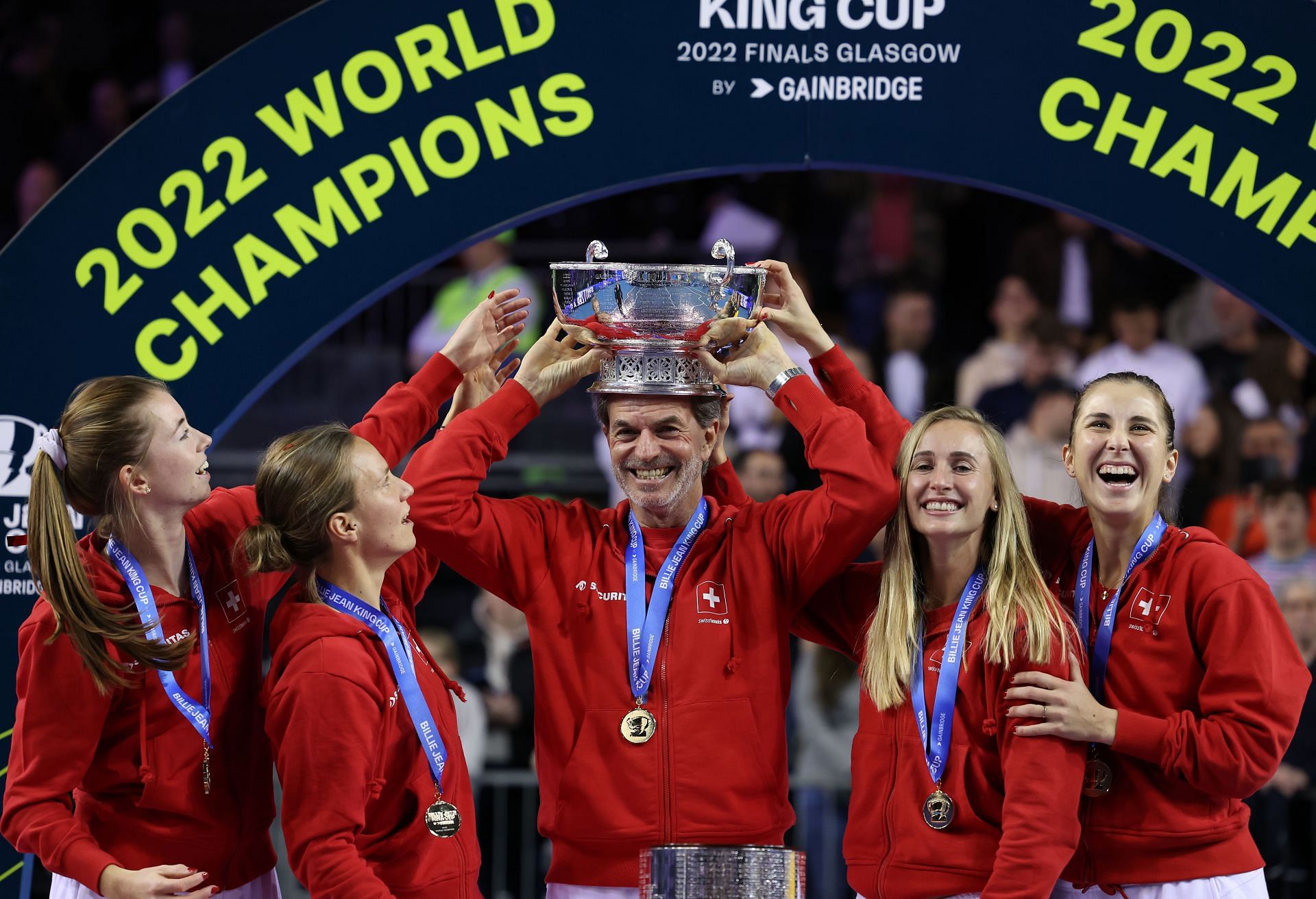 The Swiss team with the 2022 Billie Jean King Cup Finals trophy.