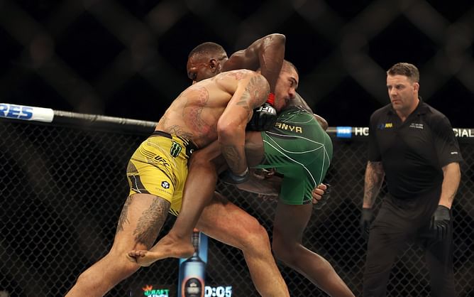 Fans react to Israel Adesanya surprisingly opening as favorite in potential rematch with Alex Pereira: "If Izzy wrestles him it’s the easiest win of his career"