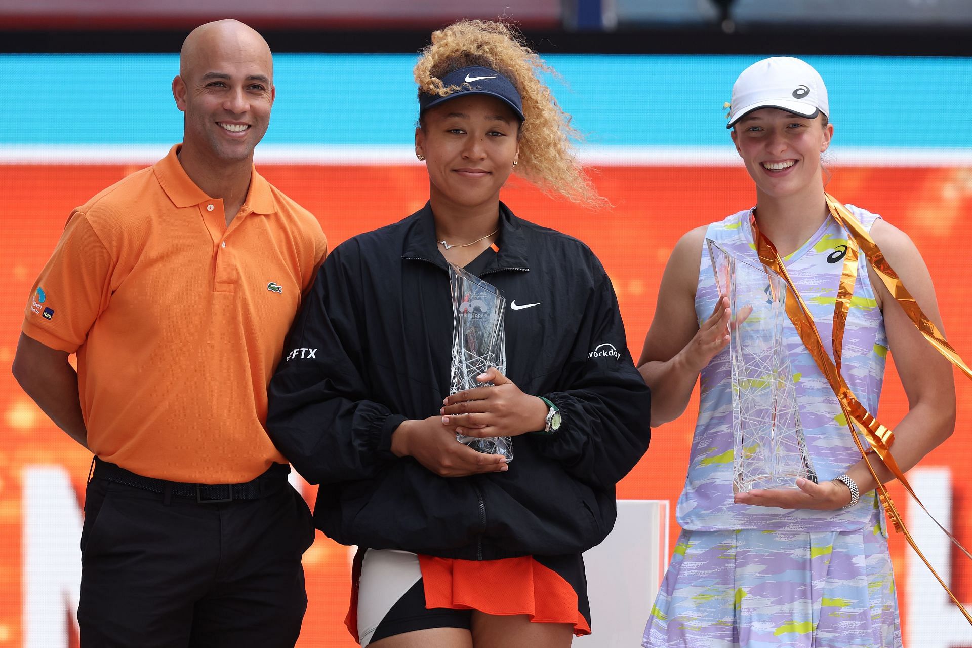 File - The FTX logo appears on Naomi Osaka's outfit during the Miami Open  tennis tournament, April 2, 2022, in Miami Gardens, Fla. A host of  Hollywood and sports celebrities including Larry