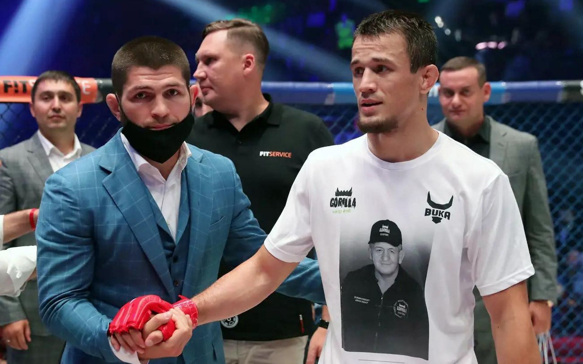 Khabib Nurmagomedov (left) and Usman Nurmagomedov (right) [image courtesy of Sergei Savostyanov/TASS via Getty Images]