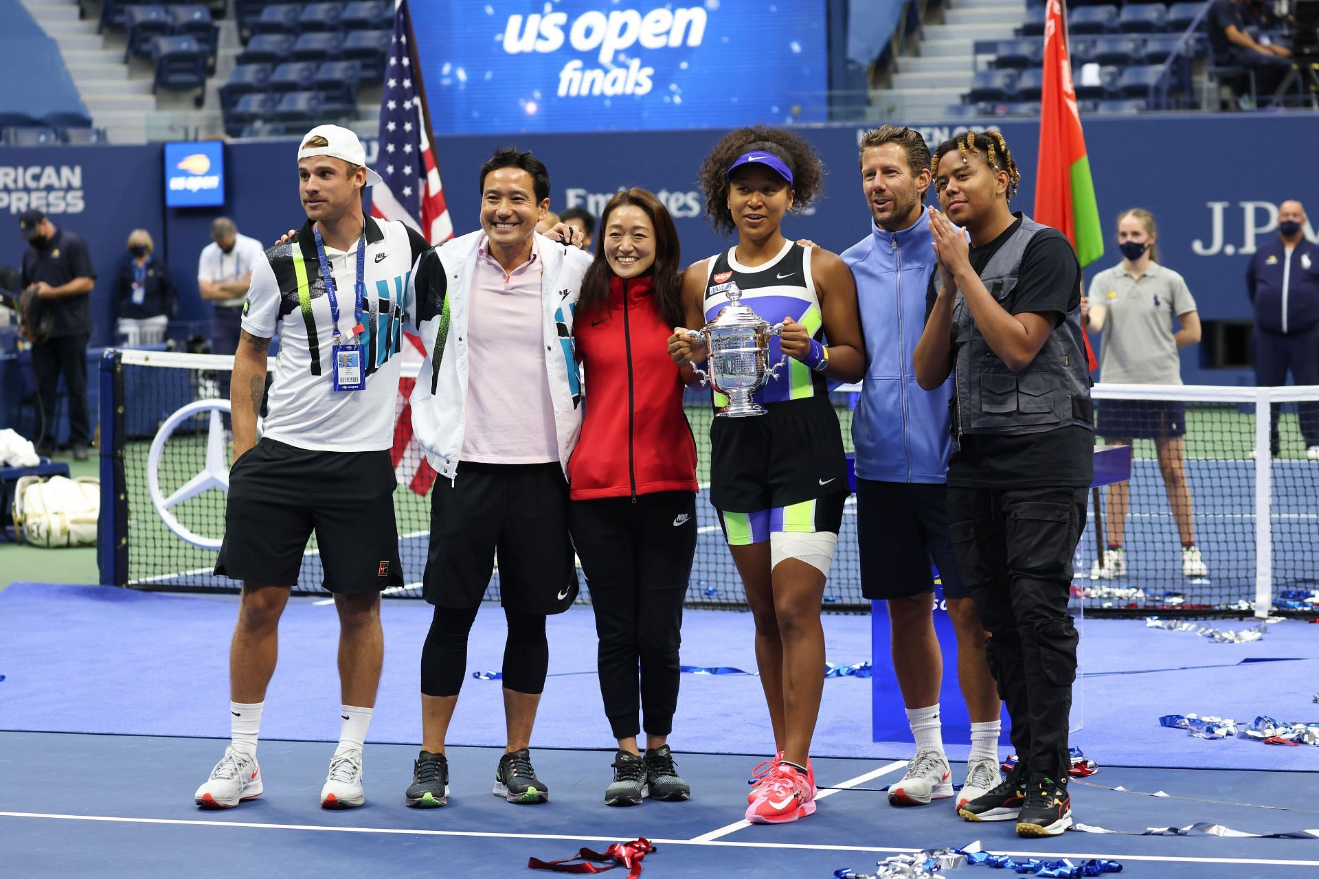 Naomi Osaka with Cordae and her team at the 2020 US Open.