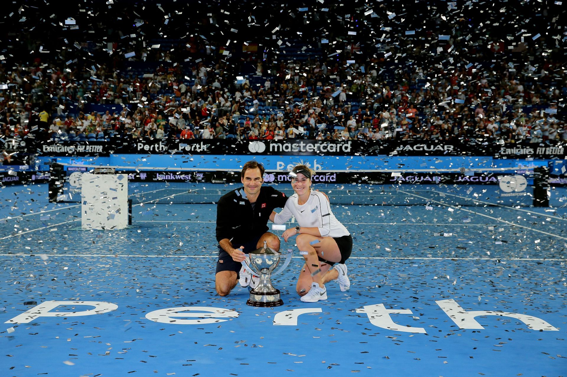 Roger Federer and Belinda Bencic successfully defend their Hopman Cup.