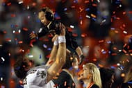Drew Brees celebrating the New Orleans Saints' Super Bowl XLIV win with his son and family