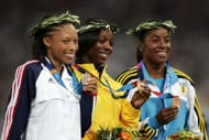 Felix (L) and Campbell (M) at the Womens 200m Medal Ceremony, Athens, 2004 (Image via Getty)