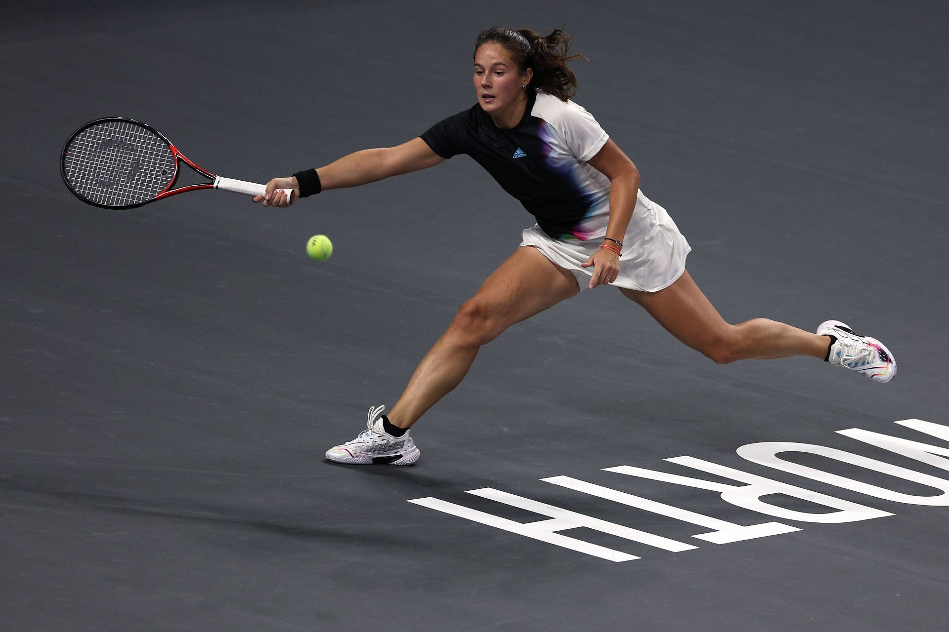 Daria Kasatkina rushes to the ball during her group stage match against Coco Gauff in the WTA Finals