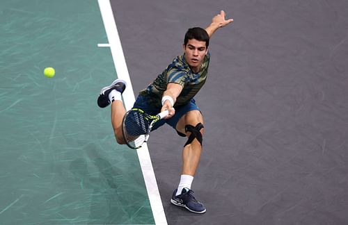 Alcaraz in action against Yoshihito Nishioka at the 2022 Paris Masters.