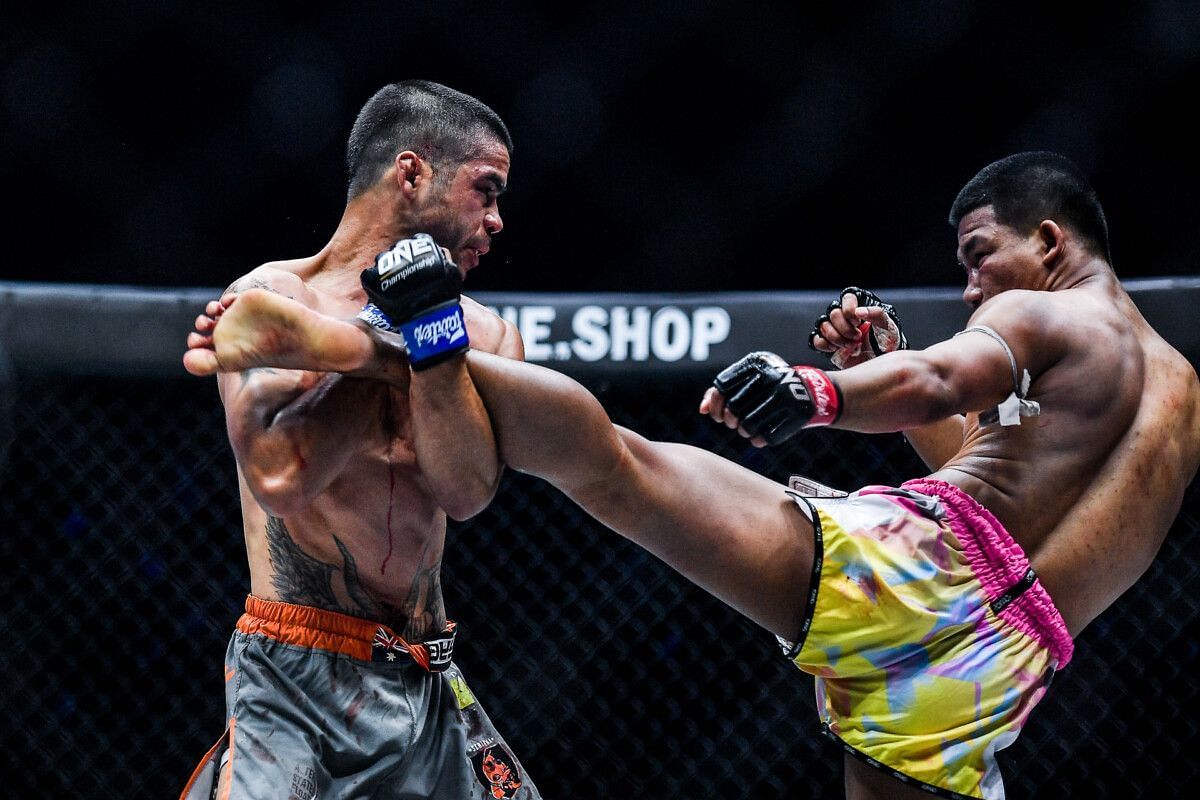 Rodtang Jitmuangnon launhes a left kick toward Danial Williams. [Photo ONE Championship]