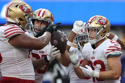 Christian McCaffrey (r) celebrates during San Francisco 49ers v Los Angeles Rams