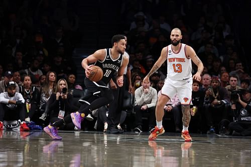 Ben Simmons of the Brooklyn Nets drives against Evan Fournier of the New York Knicks